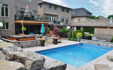 Pool, hot tub, stone retaining wall, privacy screen, upper deck