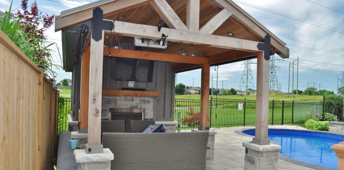Cozy and functional pool cabana with storage, TV and bar. It doesn't have to be too large to accommodate outdoor furniture.