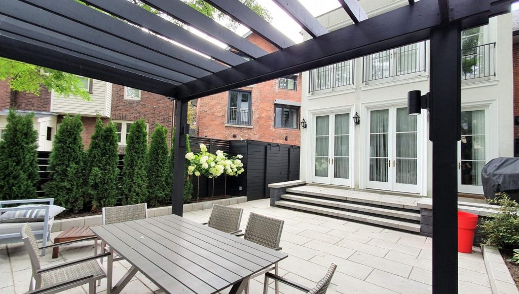 back pergola over concrete slabs patio